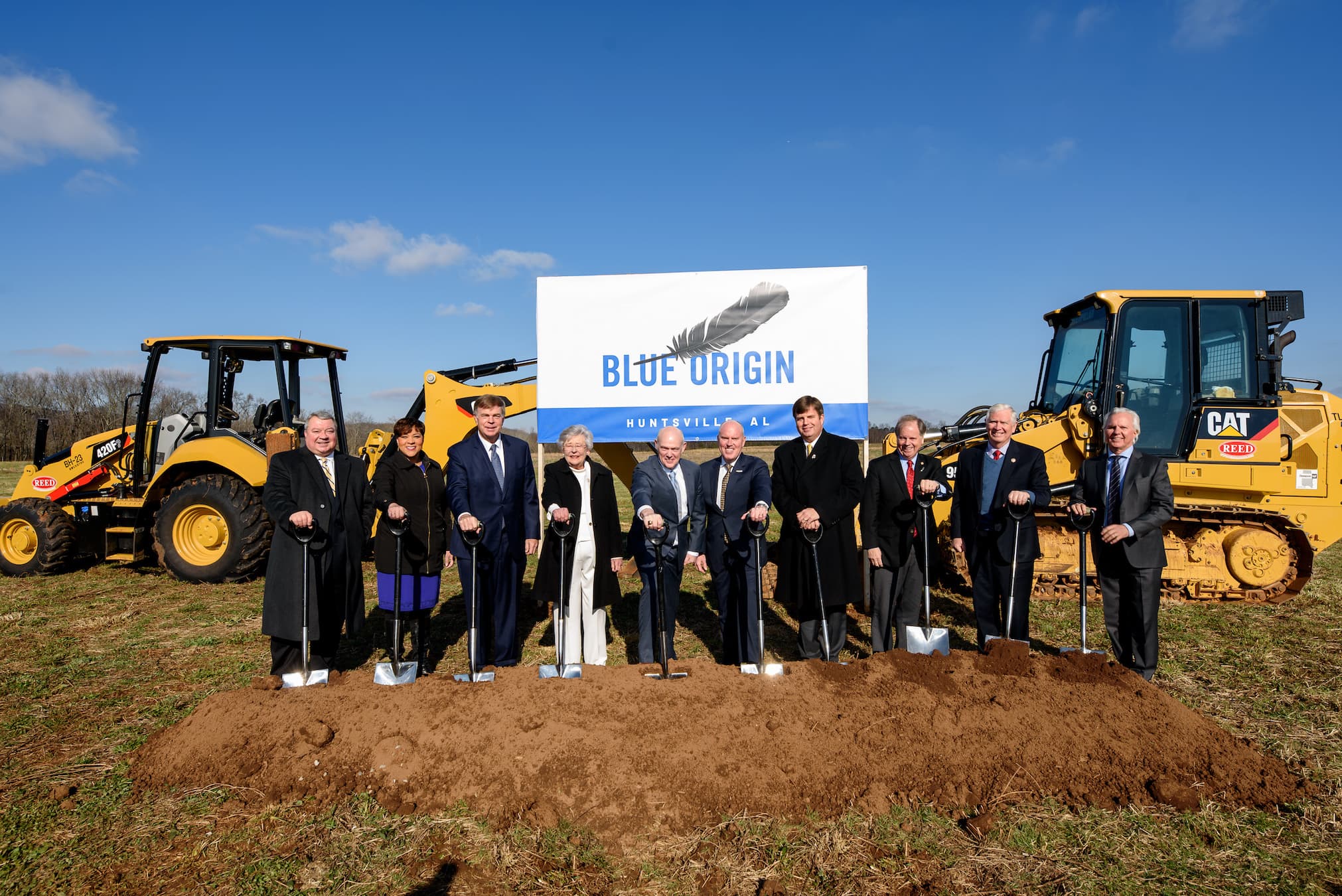 CEO Bob Smith poses with local leaders during a groundbreaking ceremony on Blue Origin's engine production facility in Huntsville, Alabama.