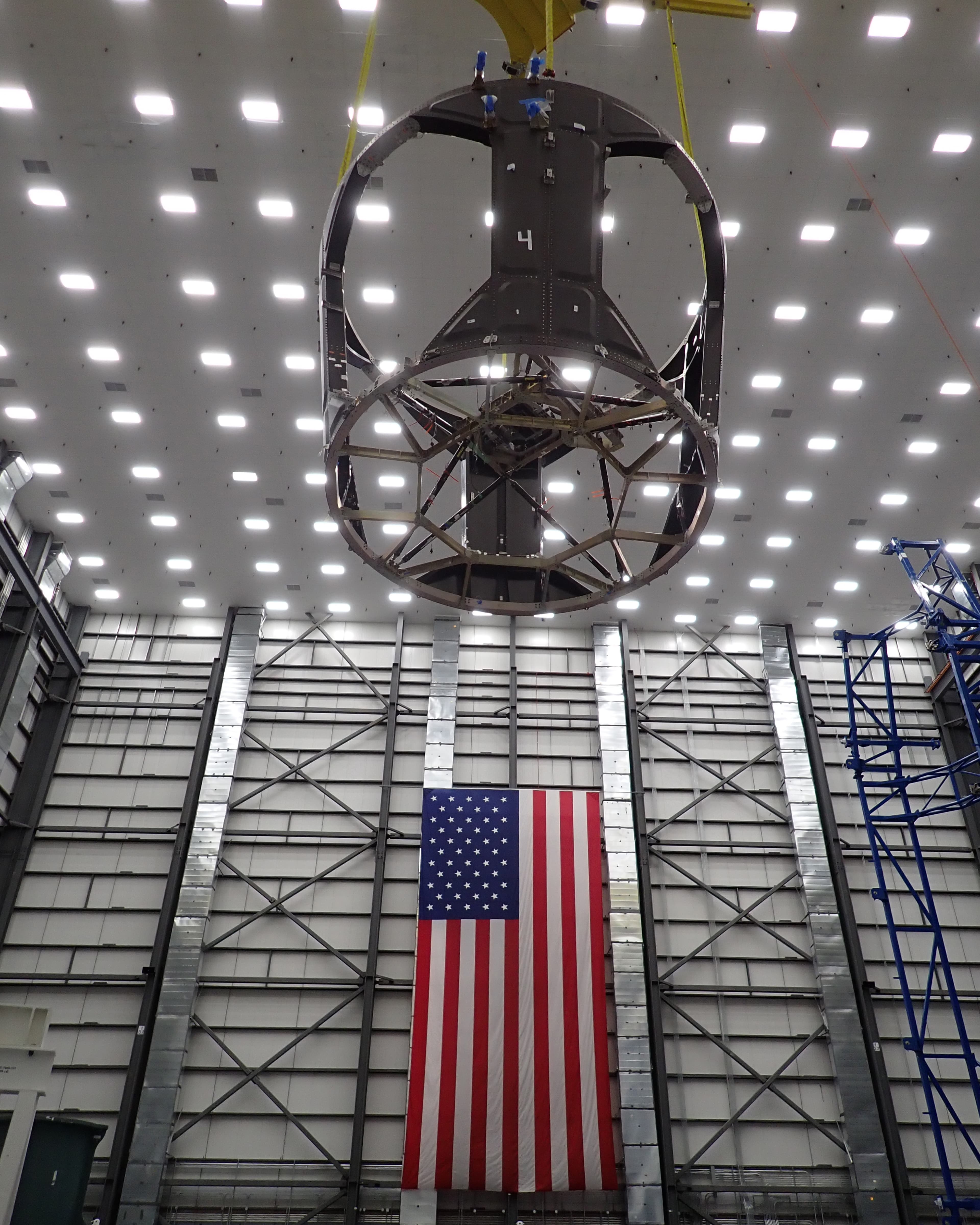 Blue Moon MK1-102 aft module being transported with the American flag in the background
